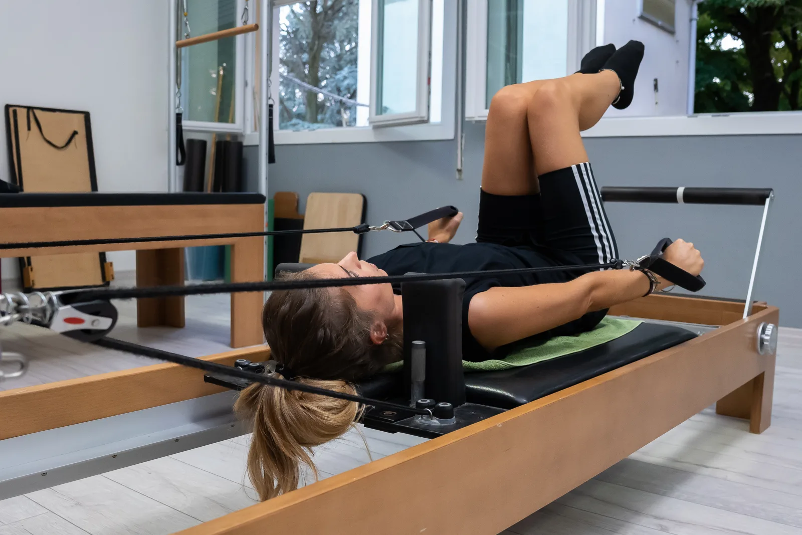 Esercizio al Pilates Reformer HealthClub Center